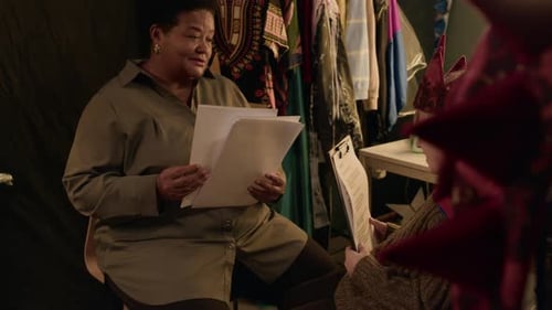 Woman and Boy Discussing Script