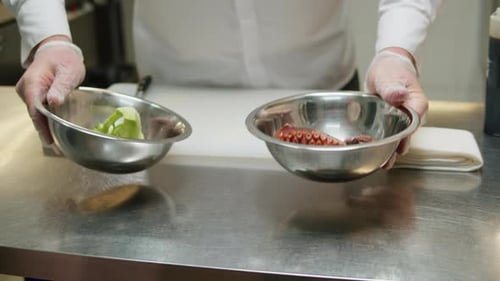 Chef Prepares Octopus and Vegetables in Kitchen