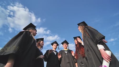 Team of College or University Students Celebrating Graduation Group of Happy Successful Graduates in