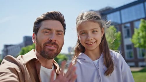 Cheerful Dad Daughter Videocall at Park Portrait Positive People Video Chatting