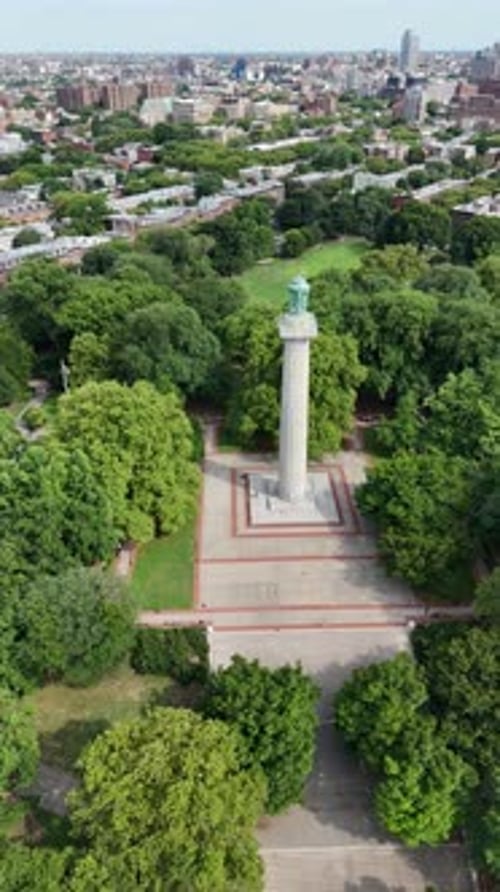 Fort Greene Park, Brooklyn, NY, Drone side-tracking shot of Prison Ship Martyrs Monument, vertical
