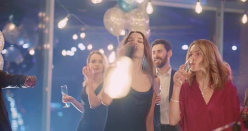 Friends Toasting Champagne at Joyful Party