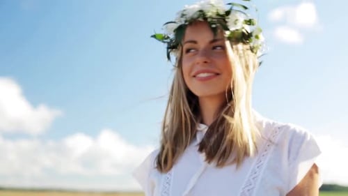 Woman with Flower Crown Smiling in the Wind