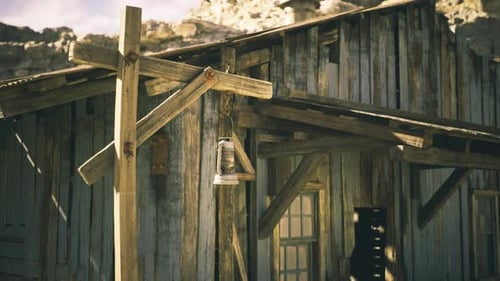 Old Wooden Building with a Rustic Bell in a Deserted Location