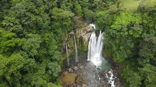 Aerial View of Waterfall in Tropical Rainforest