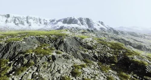 Rugged Mountain Landscape Showcasing Rocks and Sparse Vegetation in Daylight