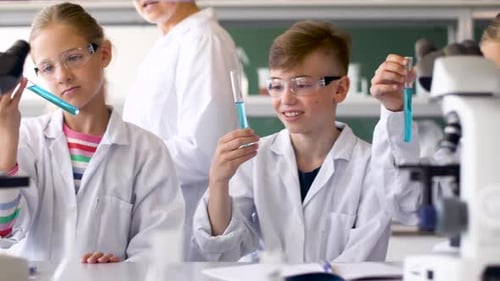 Children in Science Lab Experimenting with Test Tubes