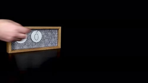 A wooden calendar block showing the date January 24th