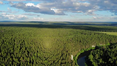 Clouds Passing Over Green Forest and River