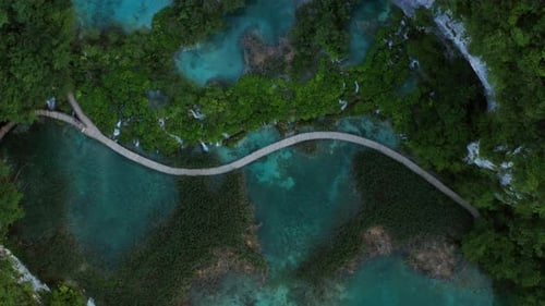 Aerial Of Wooden Boardwalk Bridge In Plitvice Lakes National Park, Croatia. Topdown