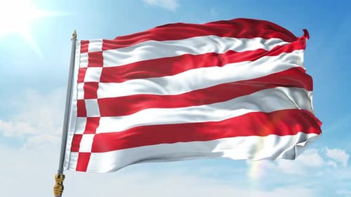Vibrant Red and White Striped Flag Waving in Blue Sky