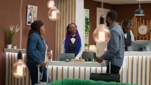 Hotel Concierge Greeting Tourists