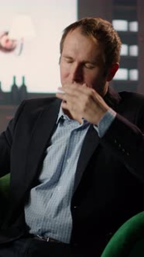 Vertical Video Old Money Elite Gentleman Drinking Strong Whiskey Due to Stress