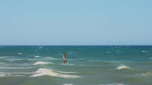 Windsurfer on a windy day in slow motion
