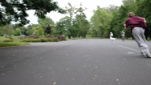 Girl Practicing Roller Scating in Park