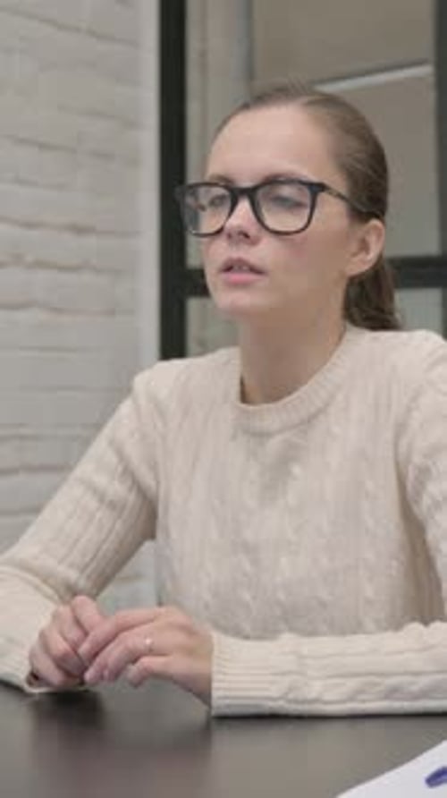 Woman at Table Talking, Waiting