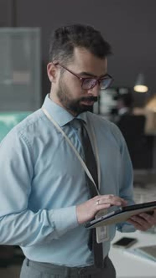 Portrait of Biracial Cybersecurity Professional at Workplace