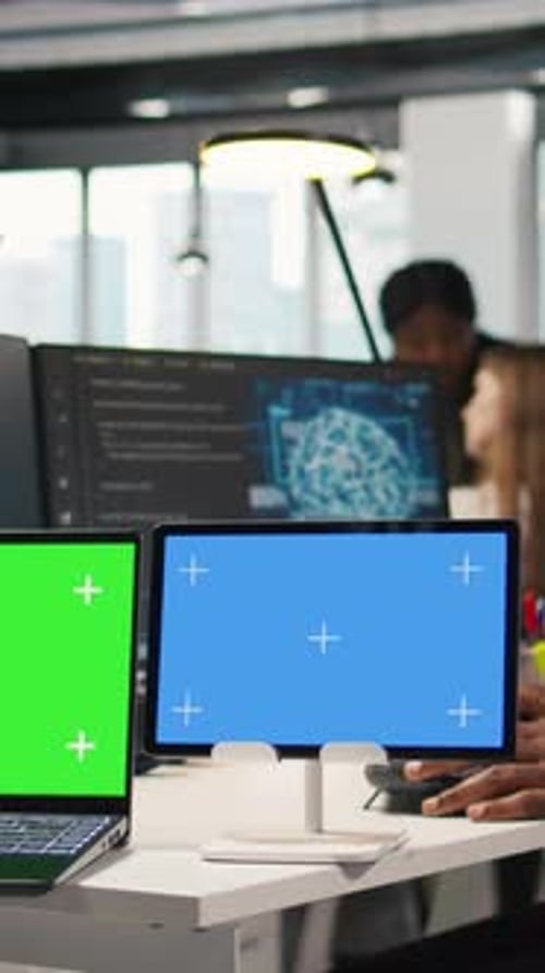 Vertical Video Software Developer Using AI on Isolated Screen Laptop and Tablet