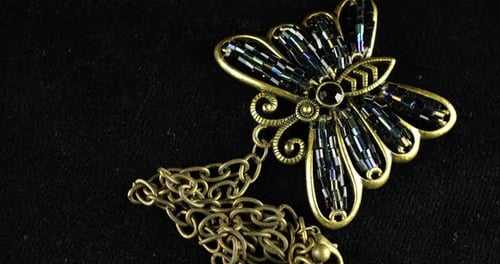 Vintage large pendant in the shape of a butterfly with a bronze-coloured metal chain