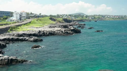 Drone view across coastal cliffs. Aewol, Jeju Island.