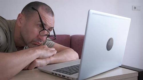 Overworked Deprived Male with Laptop