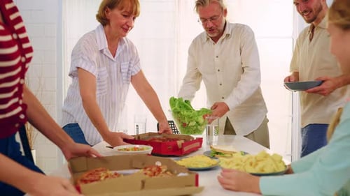 Family Mealtime: Pizza, Salad, and Togetherness at Home