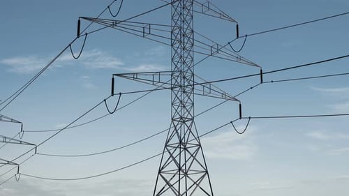 High Voltage Electricity Tower and Power Lines Under the Clear Sky