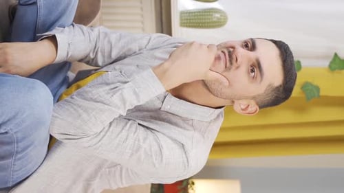 Vertical video of Aggressive and neurotic man.