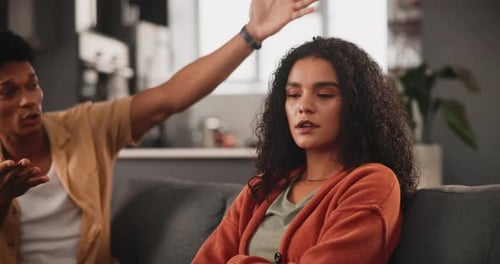 Young Couple Arguing, Woman Appears Distressed