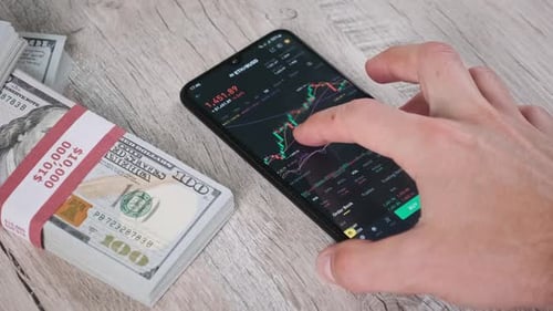 Crypto Trading in Smartphone Ethereum Graph of Price on Stock Exchange ETH