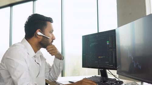Indian Trader Broker Checking Stock Trading Data Analysis Concept Working in Office with Financial