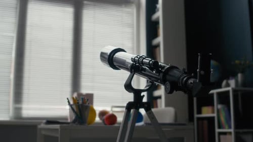 Telescope in Room Pointed Toward a Window