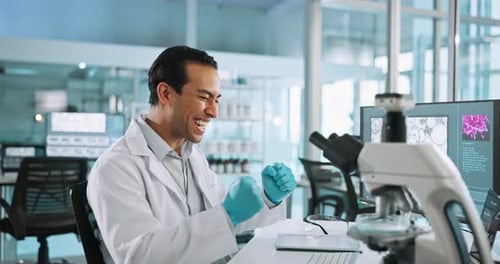 Microscope, celebration and man scientist in laboratory for DNA research, study or project