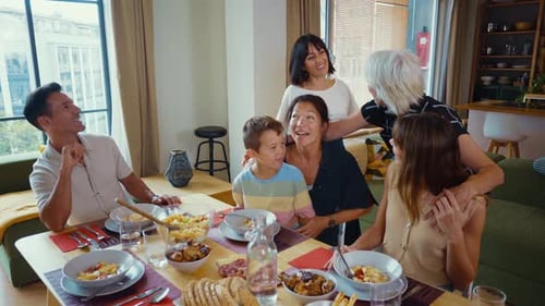 Family Gathering for Lunch in Modern Home Interior