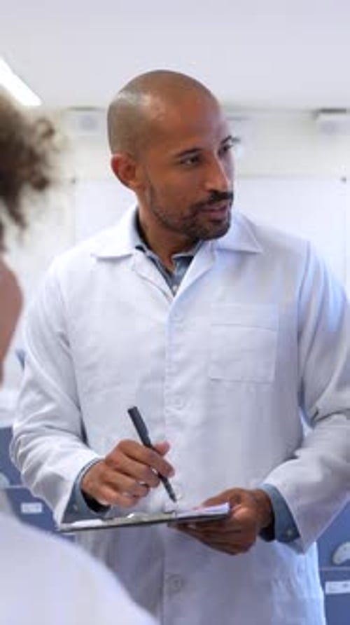 Medical Staff Discussing Patient Care in Modern Hospital