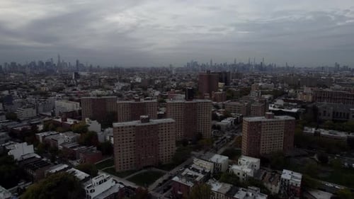 Aerial Flying Past Condominiums In Brooklyn, NYC On Cloudy Day.