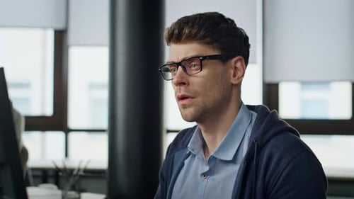 Pensive Entrepreneur Looking Computer at Office Closeup. Stressed Man Developer Analyzing Software