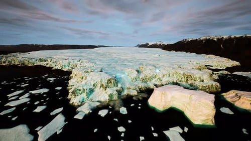 Serene Layers of Snow Blanket Vast Lands Leading to Coast During Twilight Hours
