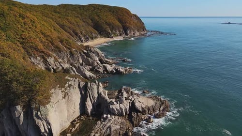 Wild Rocky Cliffs By Sea Aerial View By Drone Top View Cliffs Bask Bright Sun Sea's Beauty Beneath