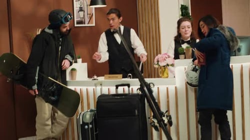 Couple Checks in for a Skiing Holiday