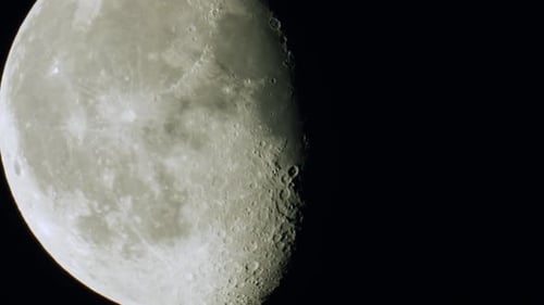 Moon phase close up waning gibbous with craters and terminator