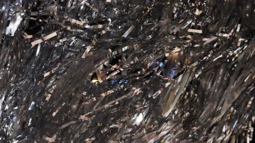 Shimmering Silver Tinsel Glittering in a Close-Up View