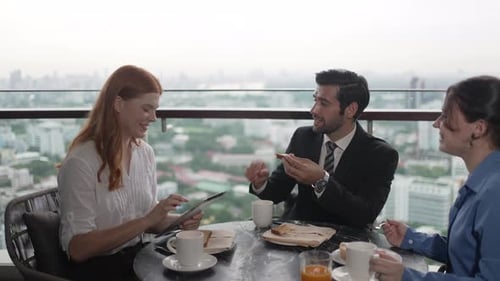 White collar worker meeting at high rise tower.