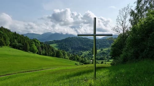 Timelapse Cross in Green Rural Mountain Landscape