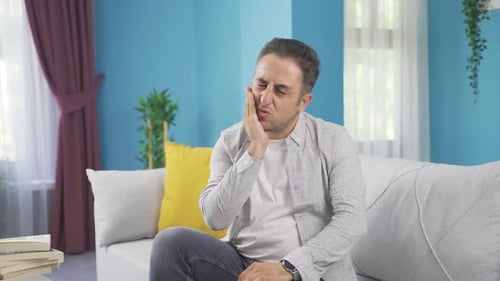 Man with toothache.