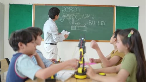 STEM Class, Teacher and students in basic engineering classroom