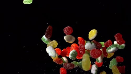 Colorful Gummy Candies Falling in Slow Motion