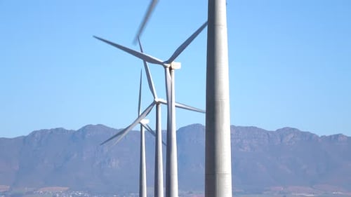 Many wind turbines on wind turbine farm