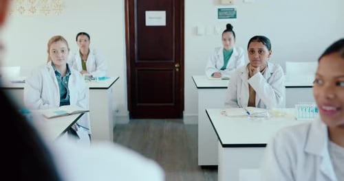 Medical, school and medicine students in a class learning at a healthcare university