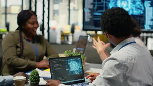 Data Scientists in Startup Office Brainstorming Leveraging AI Tech